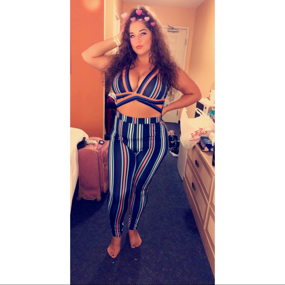 Multi-colored jump suit only worn once! 💙 🧡